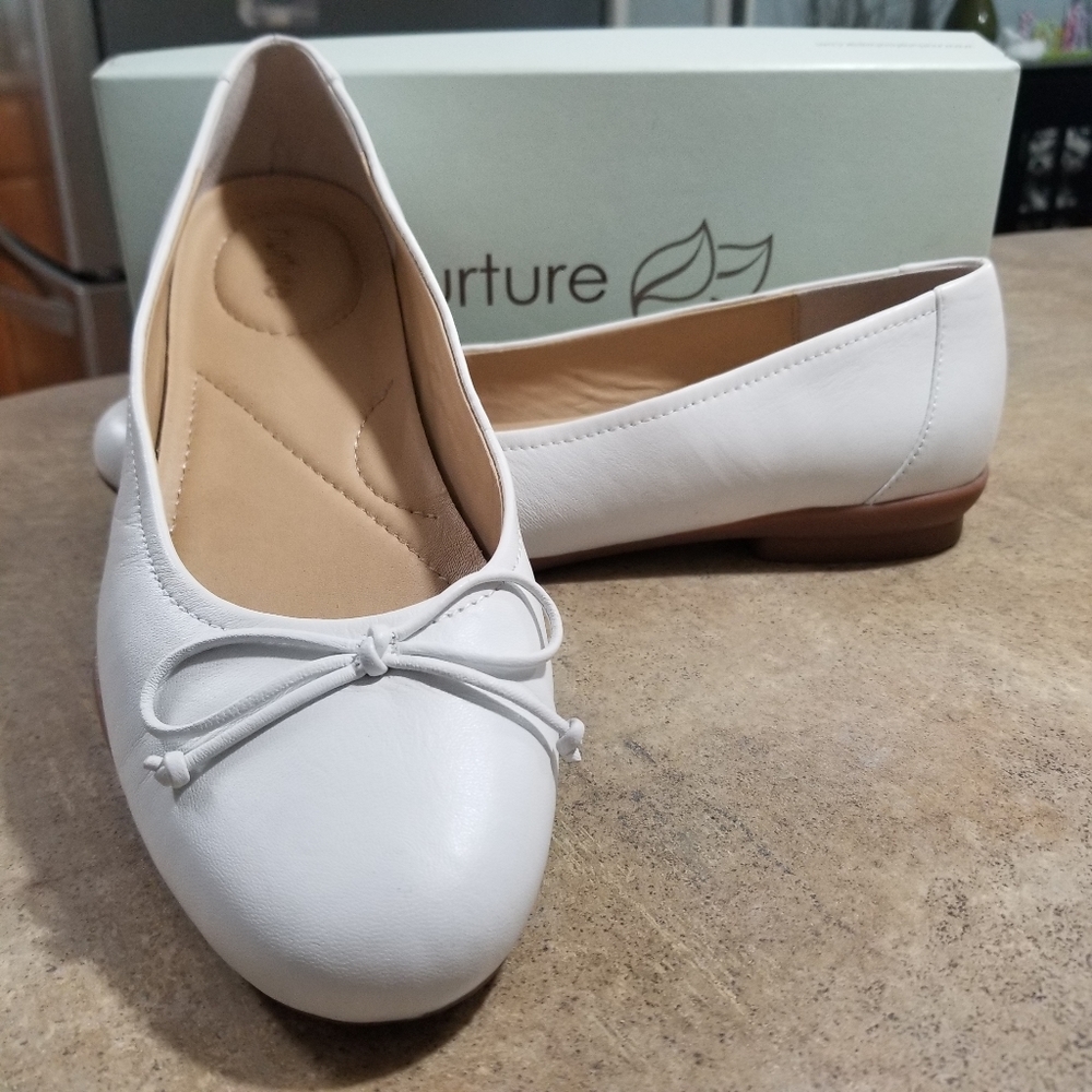 Almost new white flats still in the box